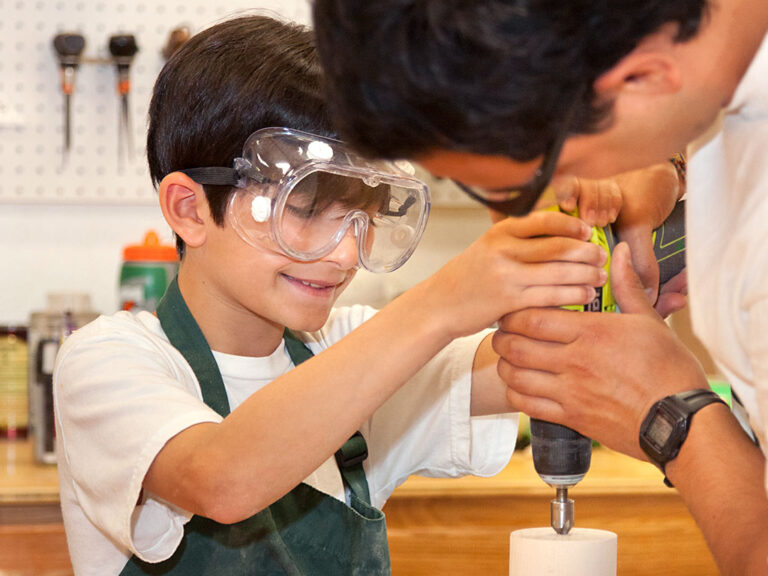 Campers working on Build It projects at Trails End Camp