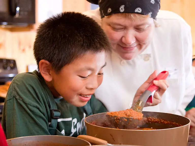 Campers experimenting with cooking at Trails End Camp
