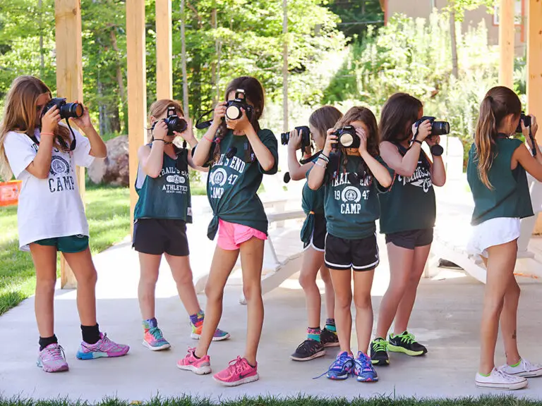 Campers using cameras at Trails End Camp