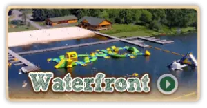 Waterfront video thumbnail showcasing aqua park activities at Trails End Camp in Beach Lake, PA